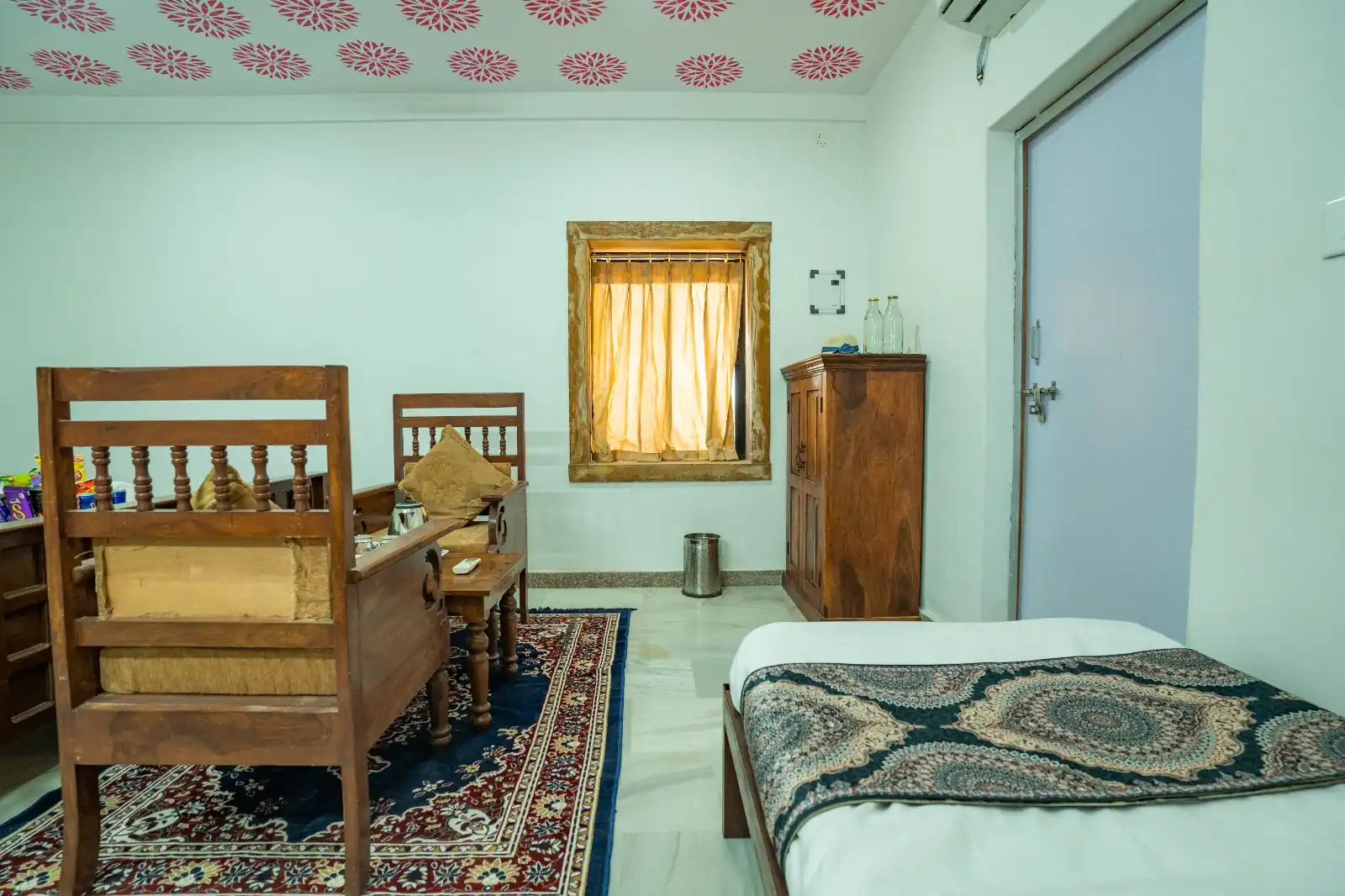 Heritage AC Room with traditional wooden furniture