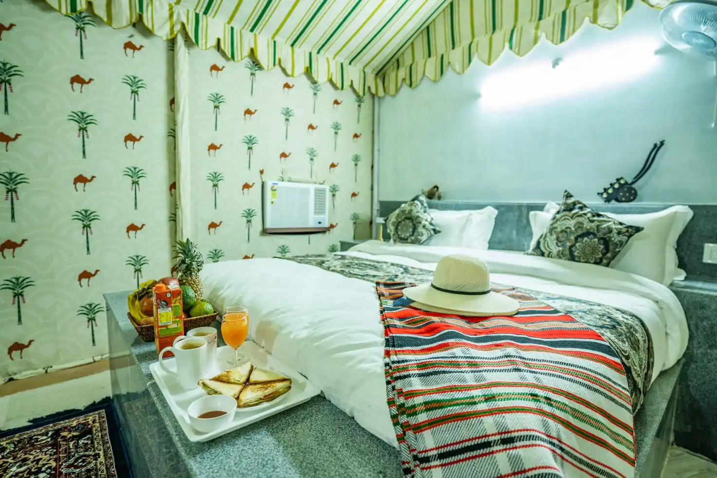 In-room breakfast served on the bed at the Maharaja Luxury AC Tent