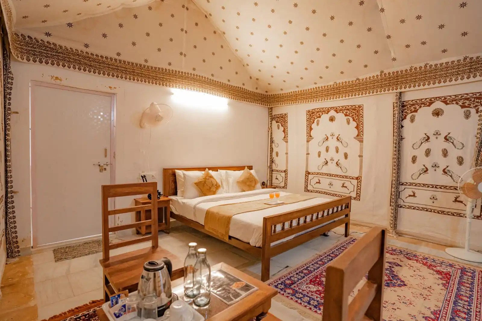 Interior of the Royal Swiss Luxury Tent with traditional Rajasthani decor
